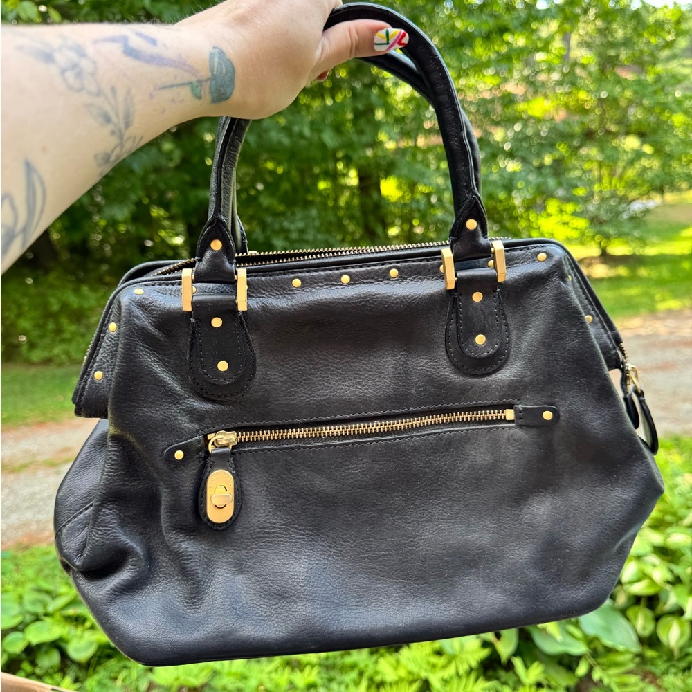 Ellen Tracy Tan and Black Handbag